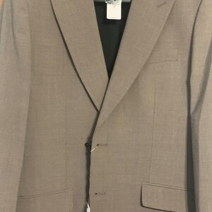 Never worn blazer from express tags still attached a grey brown color